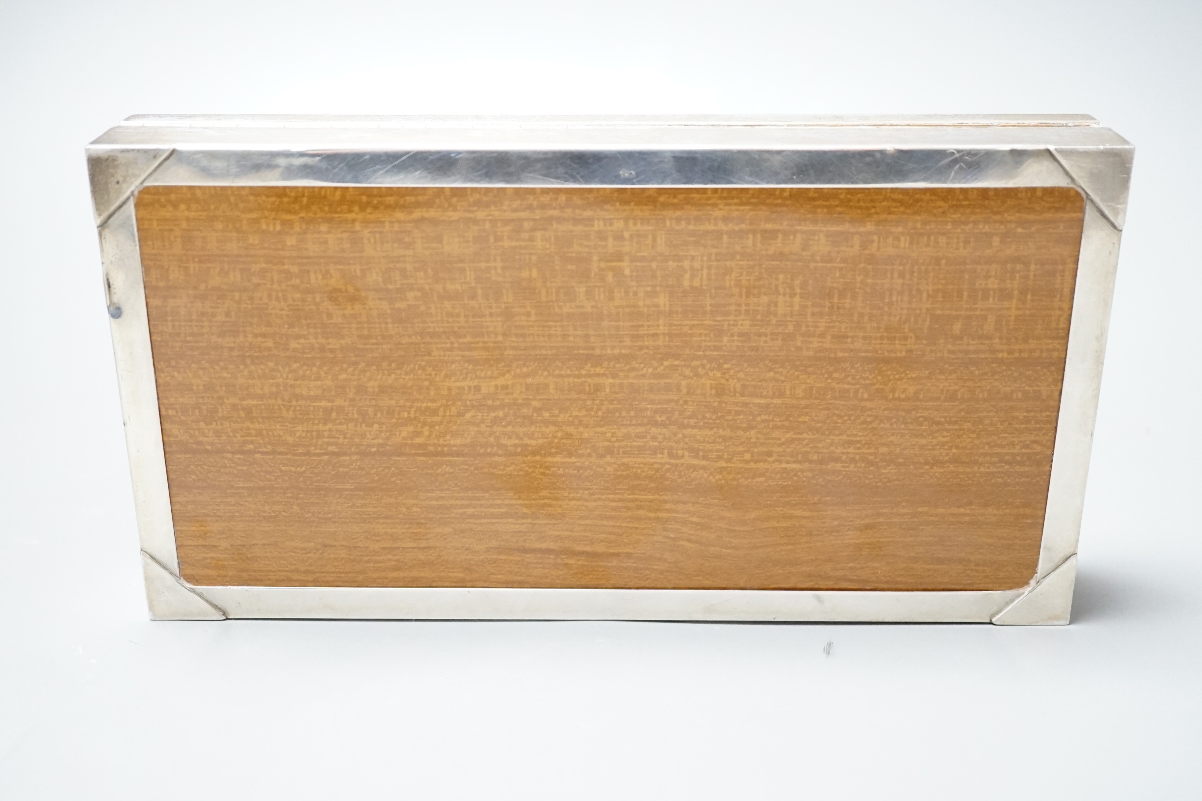 A modern 925 white metal mounted rectangular cigarette box, 20.8cm.